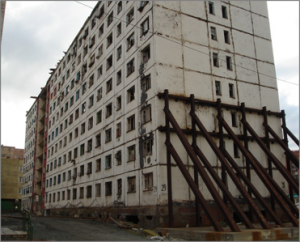 Figure 3: A building is temporarily braced against collapse.
