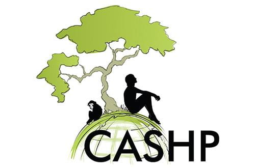 The silhouette of a person and a chimp sit under a tree. Underneath them says CASHP