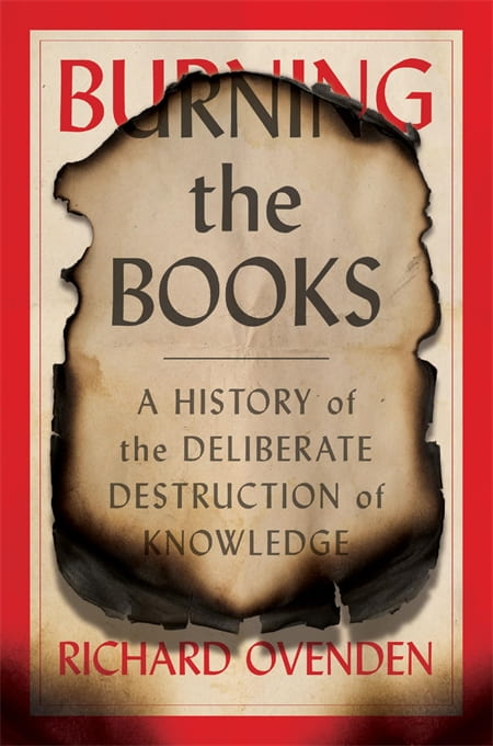 Cover of "Burning the Books: A History of the Deliberate Destruction of Knowledge" by Richard Ovendon. Cover shows a burned paper as if the book had been burned.
