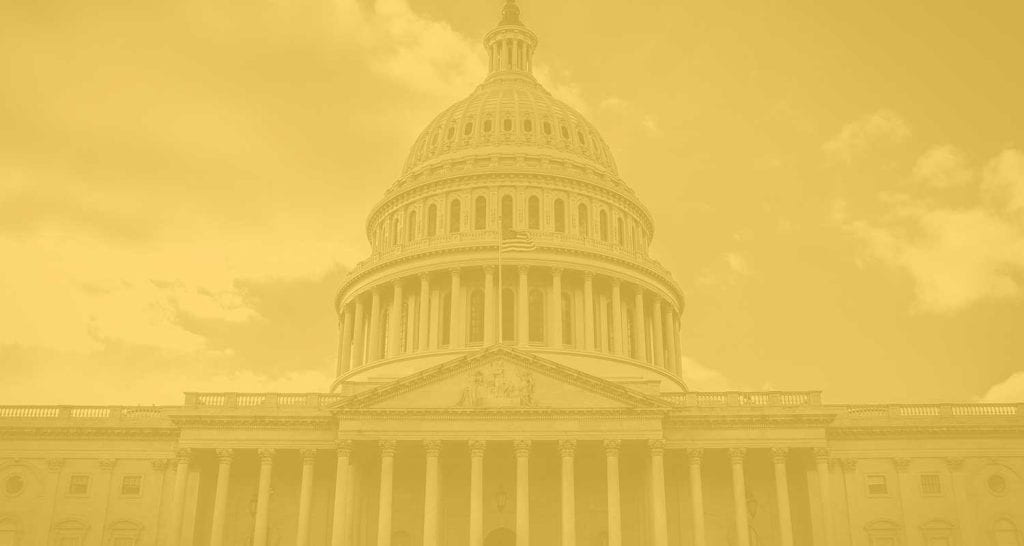 photograph of U.S. Capitol with yellow color overlay