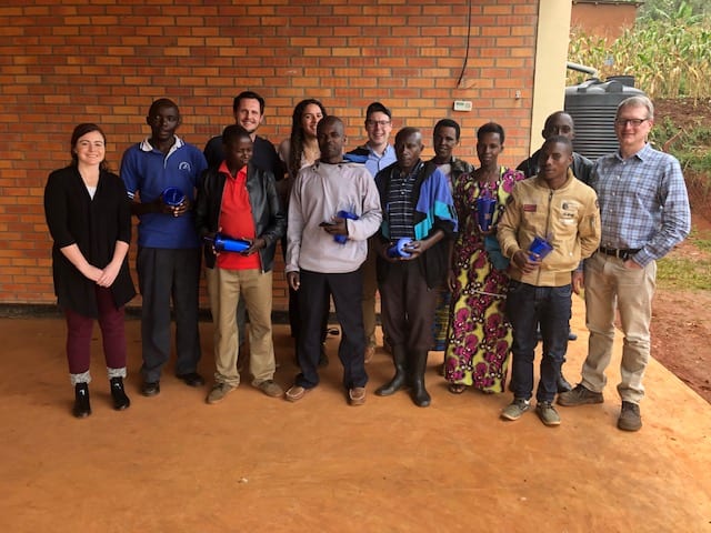 Image 2: Drew's GW team, along with Professor Click, visiting the Koremu cooperative outside Kibungo. 