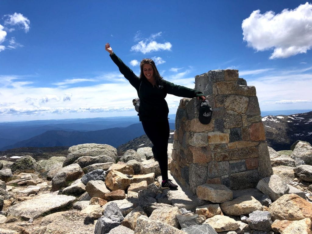 Nadia Mathis on the summit of Mt. Kosciusko in Australia
