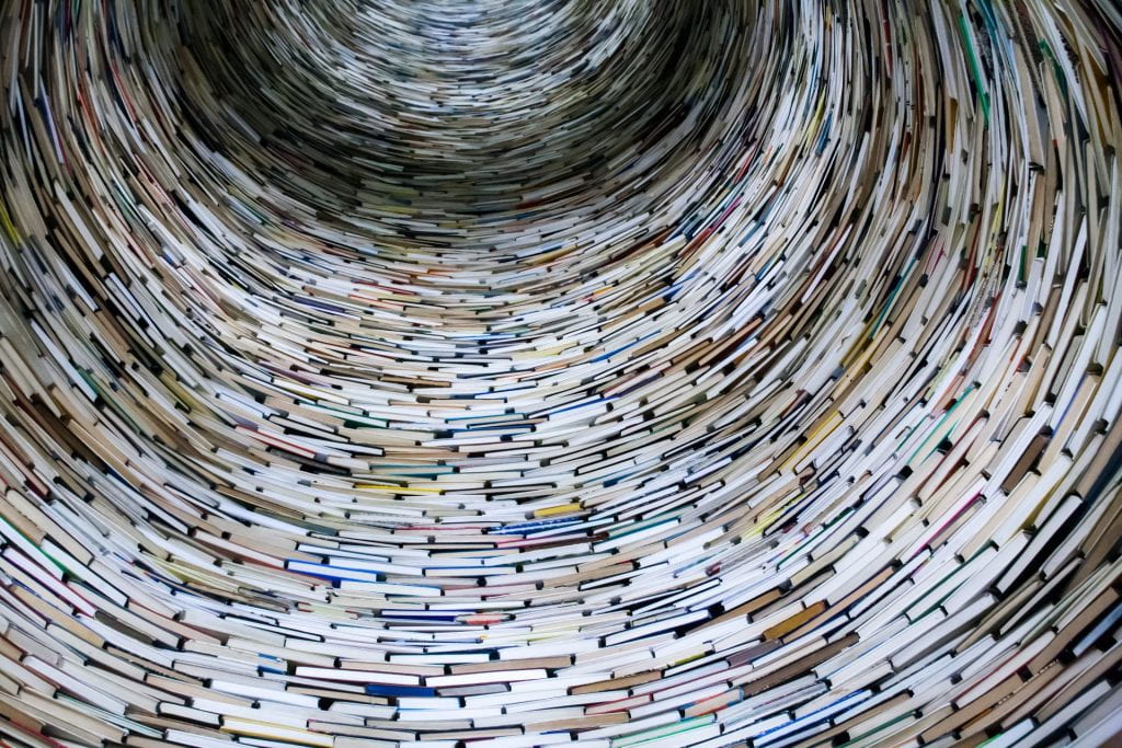 image of a tunnel made entirely of books