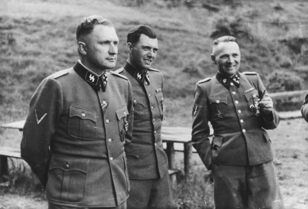 Image of Nazi officers. Left to right: Richard Baer, Josef Mengele, and Rudolf Hoss in Auschwitz.