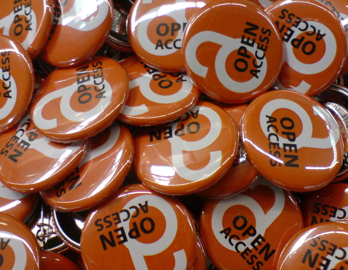 Image of orange Open Access buttons.