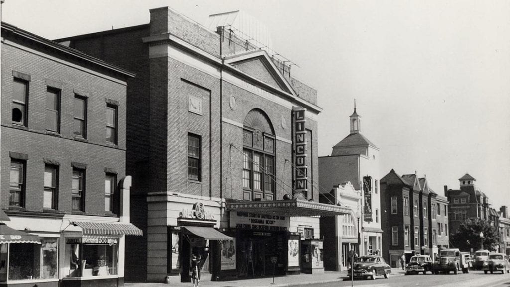 Black and white photo of the Lincoln Theater and other buildings on U Street.