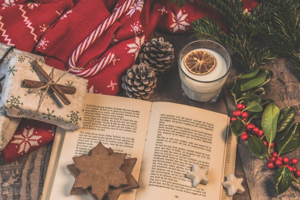 Image of open book and Christmas decorations