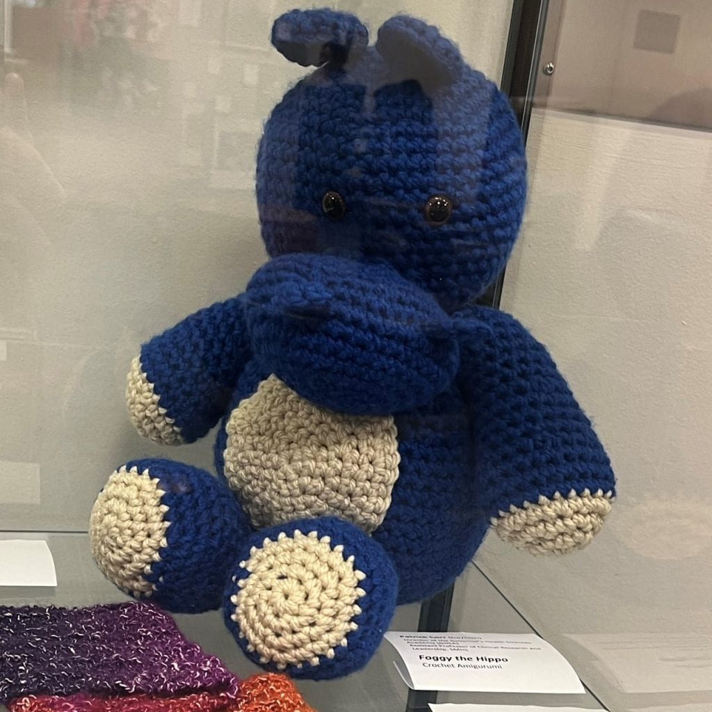 Crochet of a blue and white hippo.