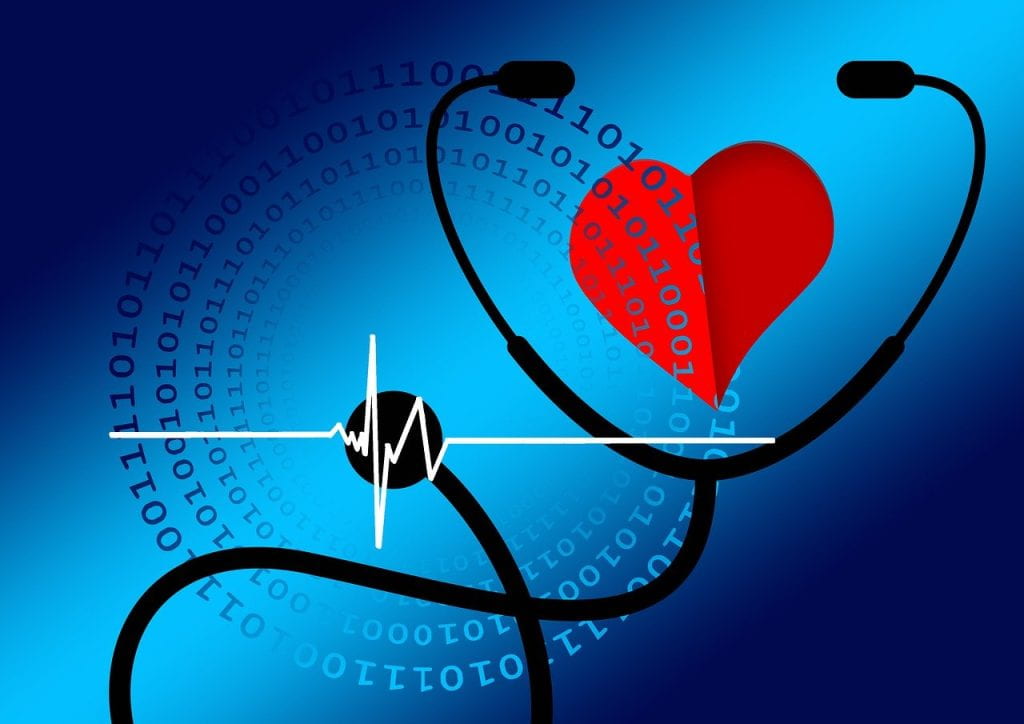 Image of a stethoscope and heart with binary code.