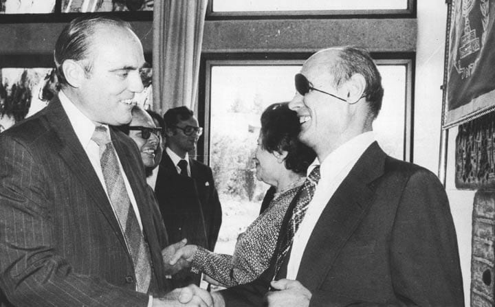 Moshe Dayan, former Foreign Minister of Israel, greets U.S. Ambassador Samuel Lewis at the New Year (Rosh Hashana) reception of the President of Israel for the Diplomatic Corps, September 9, 1977. Credit: Jerusalem-Korczak-Home.com