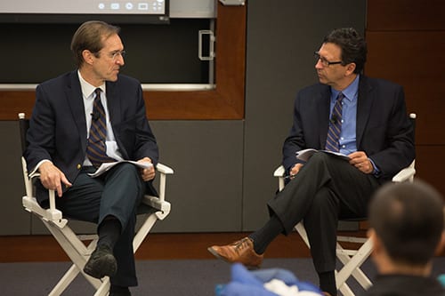 David Ensor (left), director of the Voice of America, does a live interview with Frank Sesno (right), director of the School of Media and Public Affairs, at an event on campus, January 27, 2015. 